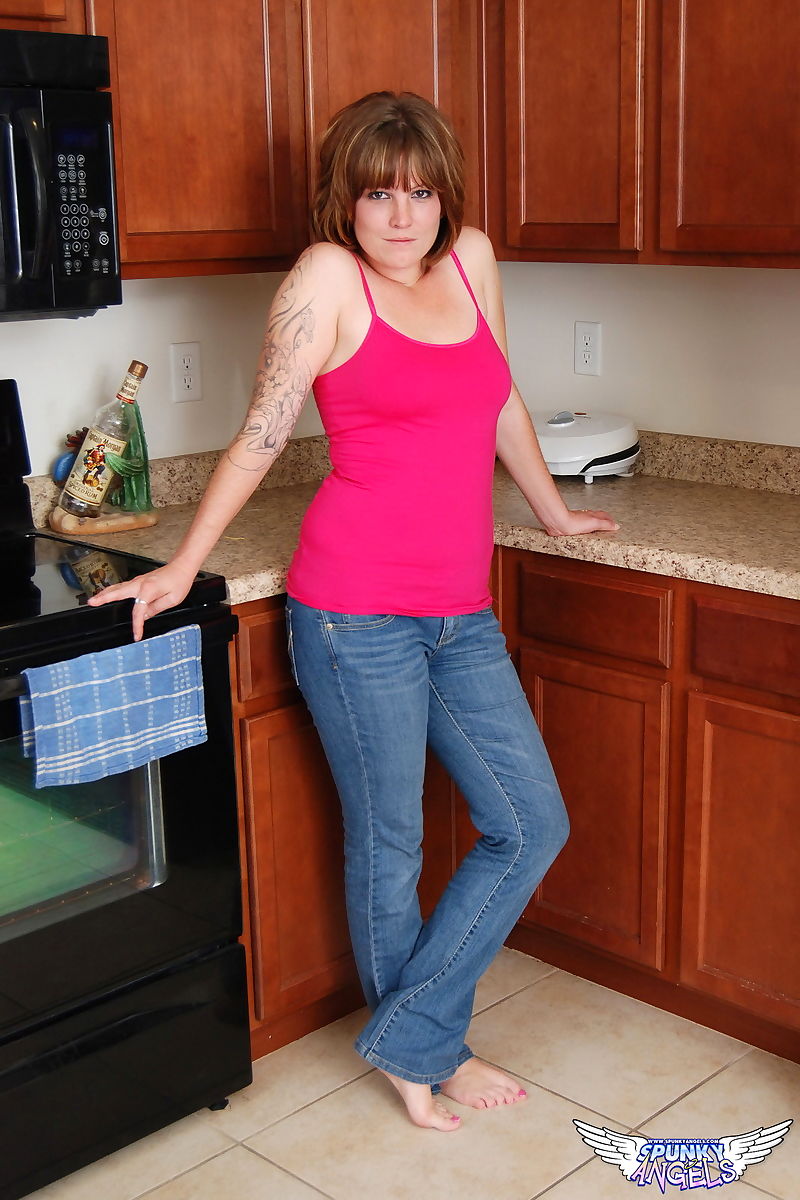 Lusty amateur housewife Misty gets naked in the kitchen