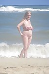 Mature older Lily May flaunts big saggy tits in casual- evening and beach wear