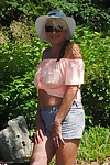 Mature British woman Denise Davies likes flashing her saggy tits in public