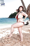 Fat babe with sexy tattoos Dors Feline posing in bikini on the beach