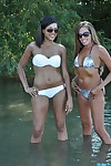 Amateur girls Lori Boating and Lori Anderson take off bikini tops together