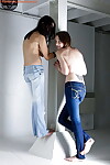 Teen girls Carly T and Rebekah strip off ripped denim jeans to model nude