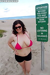 Chubby solo girl Dulcinea romps along a nude beach in her birthday suit