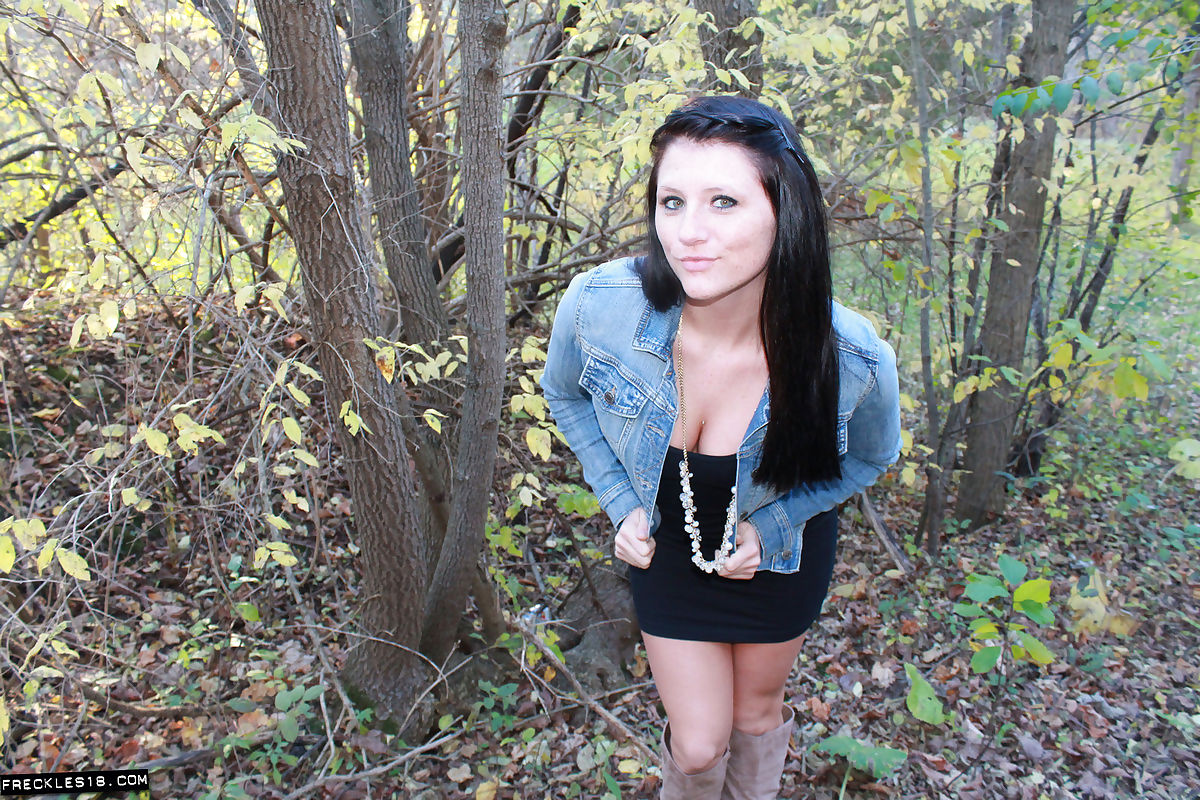 Erotic amateur Freckles teases in the woods wearing a white thong and boots