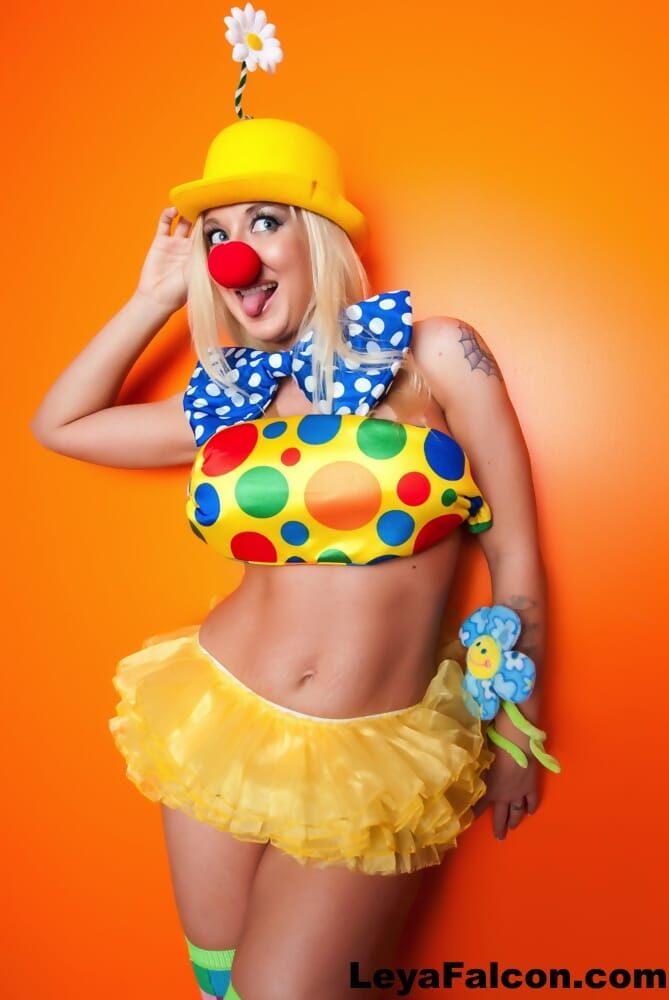 Hot cosplay MILF Leya Falcon in clown costume fondling her huge big tits